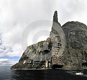 Trøllkonufingur - imposing rock pillar of Sandavágur.