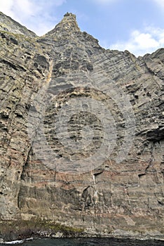 Trøllkonufingur - imposing rock pillar of Sandavágur.