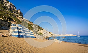 Tsambika beach landscape with Greece flag
