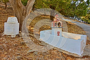 tsambika monastery as miniature at the road to the hill