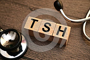 TSH, text words typography written with wooden letter, health and medical photo