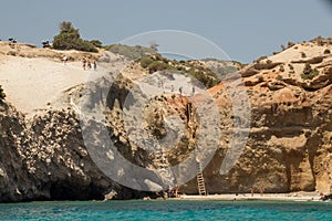 Tsigrado beach with people, Milos island photo