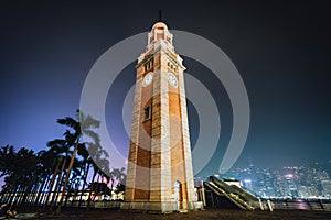 The Tsim Sha Tsui Clock Tower at night, in Kowloon, Hong Kong.