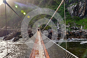 Tsitsikamma suspension bridge with lens flare