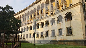 Tsqaltubo abandoned palace building exterior facade with stairs.