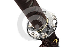 Tsuba : hand guard of Japanese sword made of steelâ€‹ isolated in white background.