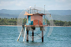 Tsunami early warning system station in middle of sea photo
