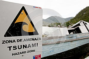 Tsunami Hazard Zone Sign - Caleta Tortel - Chile photo