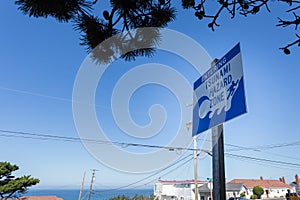 A tsunami warning sign along a coastal highway near the Oregon coast.