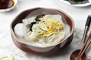 Tteok mandu guk, Korean dumpling and rice cake soup photo