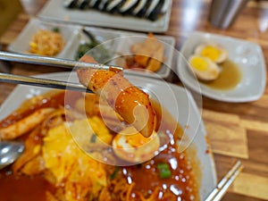 Tteokbokki Korean spicy rice cake Cheese in Korean restuarant photo