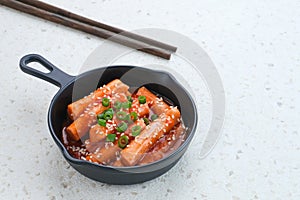 Tteokbokki or Topokki , stir fried rice cake stick, popular Korean street food