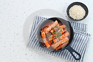 Tteokbokki or Topokki , stir fried rice cake stick, popular Korean street food