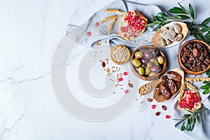 Tu Bishvat holiday symbols - dried fruits, pomegranate, barley, wheat