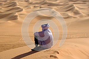 Tuareg in desert, Libya photo