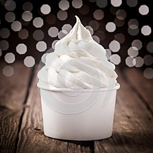 Tub of creamy vanilla or lemon ice cream