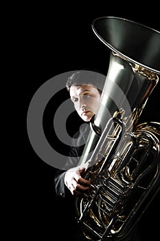 Tuba player brass instrument. photo