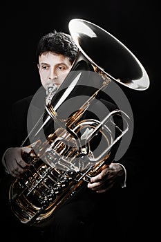 Tuba player. Brass musicians with instruments photo