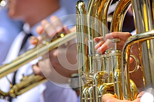 Tuba and trumpet in brass band photo