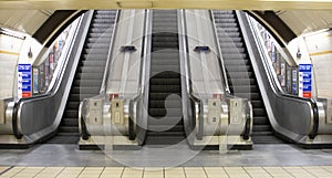 tube station exit, escalators, symetry photo