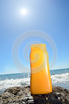 Tube with sun protection on beach of ocean