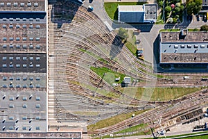 Tube train depot with many rail tracks. aerial photo