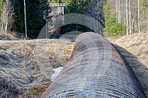 Tube of wood and steel leading the water from a dam to the generator room