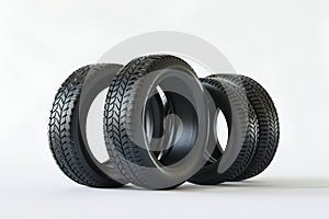 Tubeless car tires on a white background.