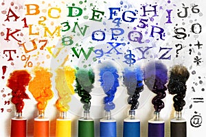 Tubes of paint with alphabet photo