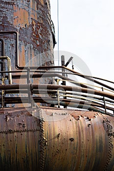 Tubes, pipes, and walkway, rust patina, urban industrial architecture