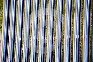 Tubes of a solar heating system as a background