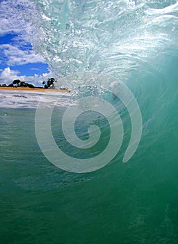 Tubing Wave on the Beach in Hawaii photo