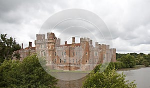 Tudor castle with moat photo