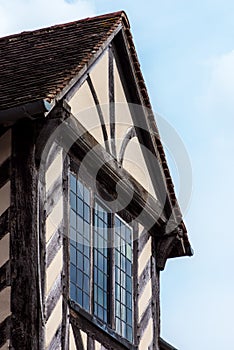 Tudor house exterior detail built in 1590 detail of window and roof Blakesley hall closeup