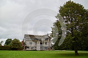 Tudor house and trees photo