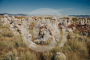 Tufa columns reflected in the mirrored water surface at Mono Lake, California