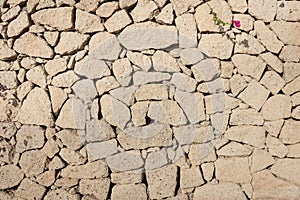 Tuff stone wall background , natural stone wall