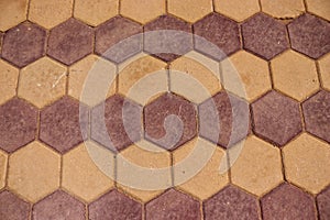 Tuff tiles on foothpath are made from durable materials