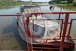 Tug boat for a ferry across the river for the transportation of cars