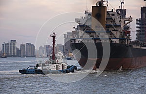 Tug boat and freighter