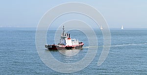 Tug Boat in the middle of nowhere photo