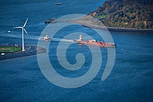 Tug boat pushing barge