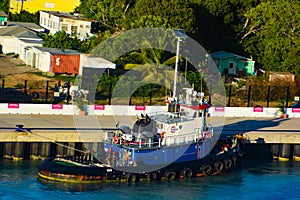 Tug boat tied up at dock in St Maarten