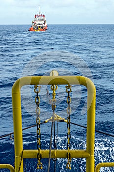 Tug boat towing a construction work barge