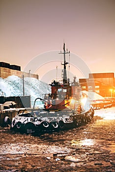 Tug at night in port