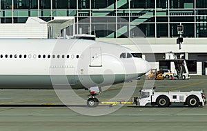 TUG Pushback tractor with Aircraft.