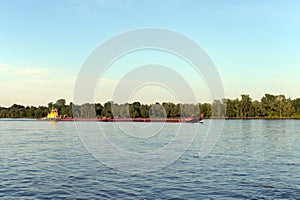 Tug-pusher `Ruslo` on the river Ob.
