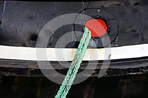 Tug ship docked with rope