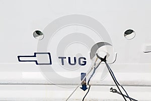 Tug Sign on a White Ships Hull