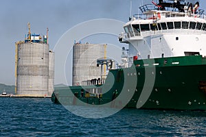 Tug towing base offshore oil platform